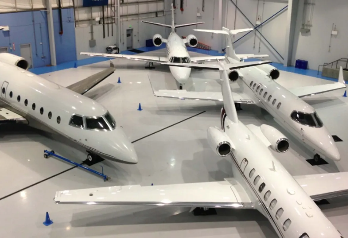 Business jets in a hangar